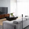 Surround 700 g1 Surround 700 in a room with sofa on a table beside a wall